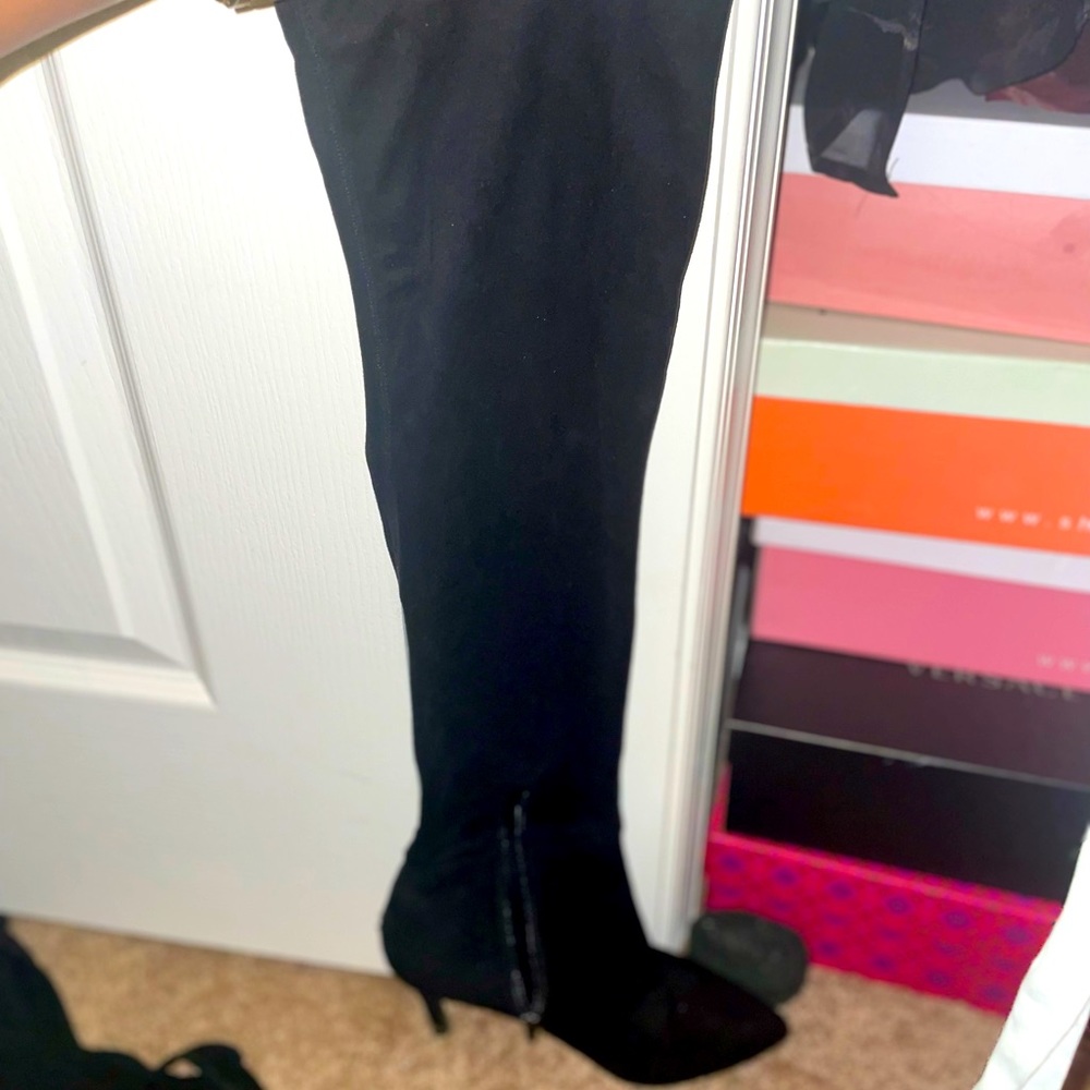 Sleek black over the knee boots. Comfortable with a cute heel